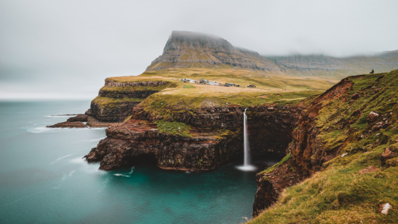 beach mountain and waterfall